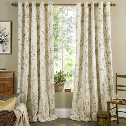 Pussy Willow Lined Eyelet Curtains in Ochre by Laura Ashley